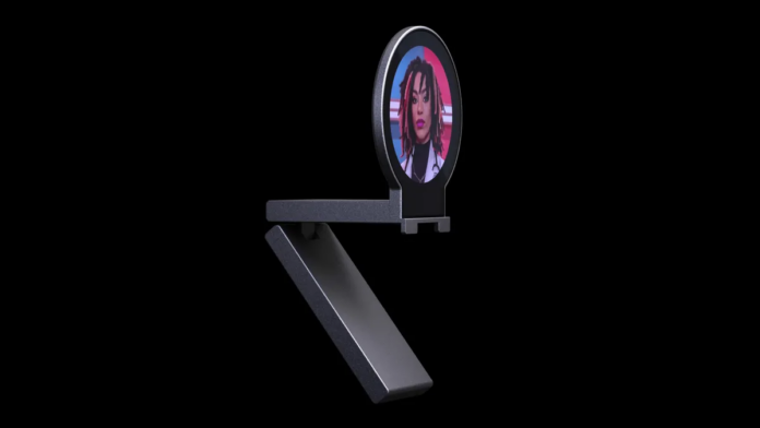 Even Napster has AI: this new holographic assistant watches you Napster View hardware device. The screen shows an AI-generated image of a young black woman.