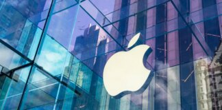 Apple logo on a glass building