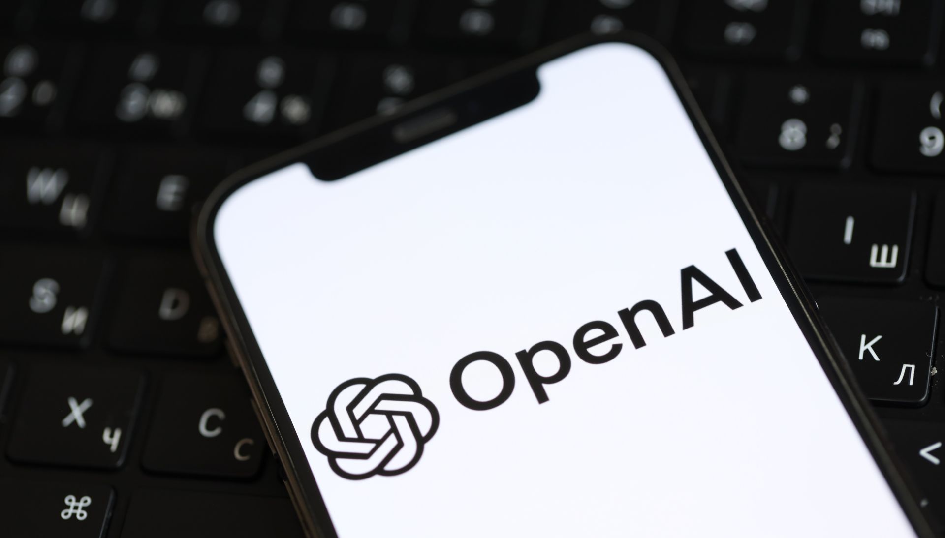 OpenAI logo on a smartphone screen