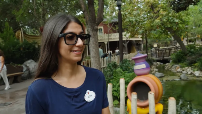 An image showing a Disney Imagineer wearing Meta&apos;s Ray-Ban smart glasses while walking around Disneyland