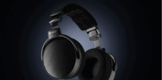 HEDD D1 headphones in black, on a dark and backlit background