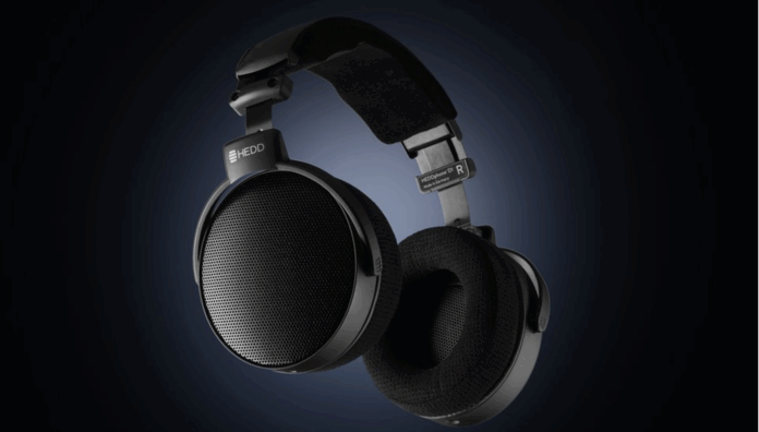 HEDD D1 headphones in black, on a dark and backlit background