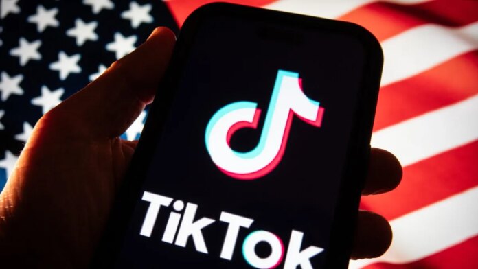 tiktok-logo-and-american-flag-gettyimages-2194103715