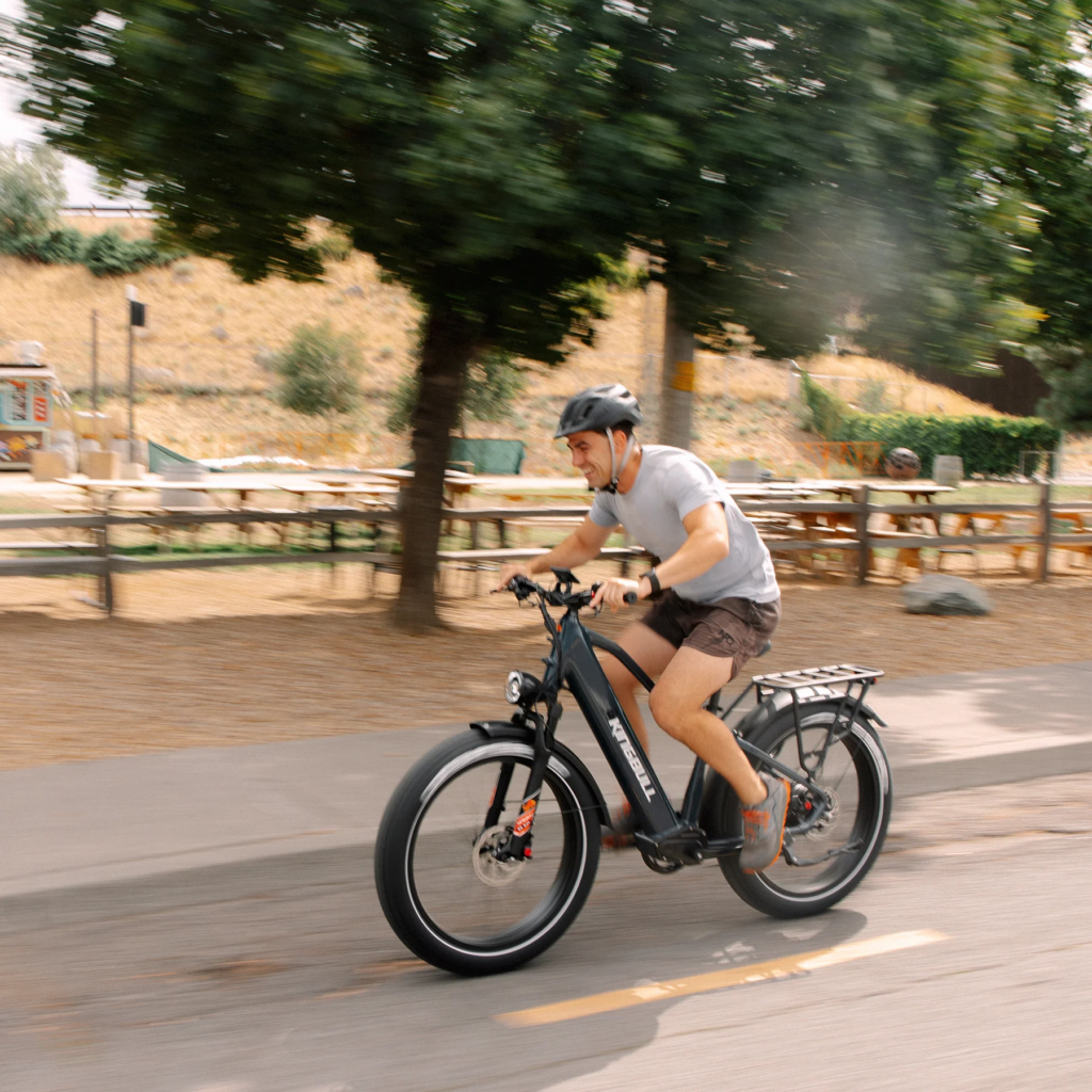 Rider on Kingbull Discover 2.0 electric bike on city street