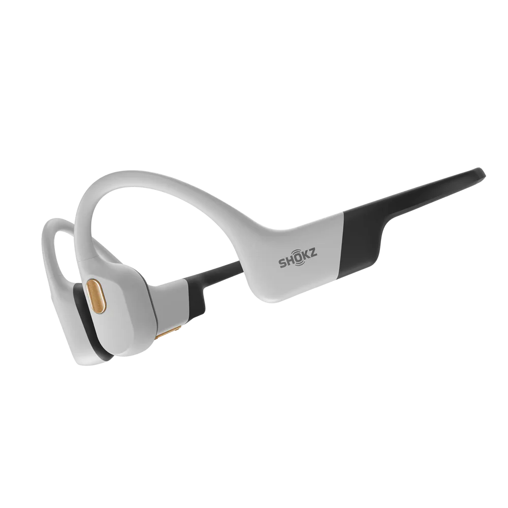 Shokz OpenSwim Pro bone conduction headphones in red colorway, side profile view