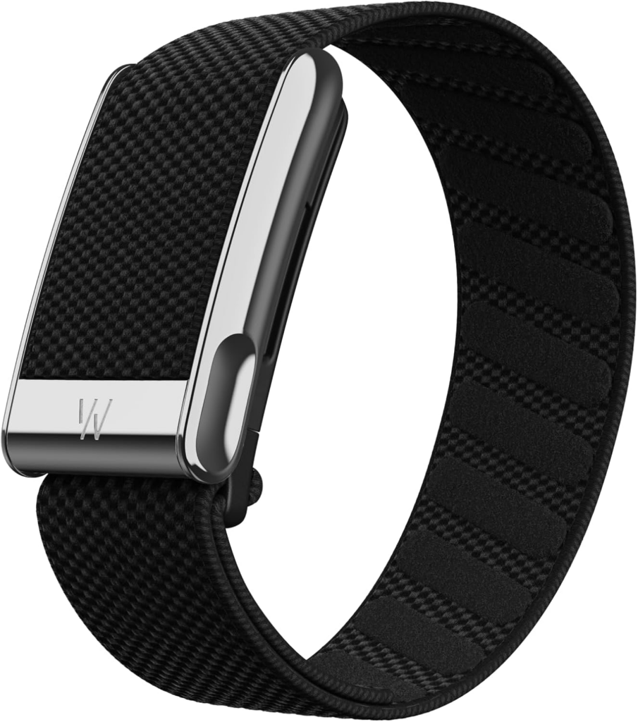 Whoop 5.0 wristband worn on wrist showing AI sleep tracker design compared to Oura Ring